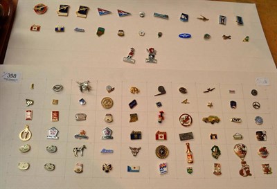 Lot 398 - A collection of aviation related lapel badges, mounted on two boards