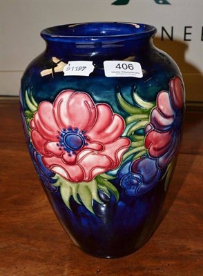 Lot 406 - A Walter Moorcroft Anemone pattern vase, on a blue ground