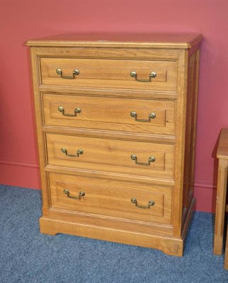 Lot 888 - A Michael  "Seahorseman " Riley Panelled Oak Chest-of-Drawers, with moulded top, above four...