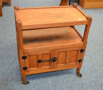 Lot 891 - A Yorkshire School Oak Tea Trolley, the rectangular top above an undertier, above two cupboard...