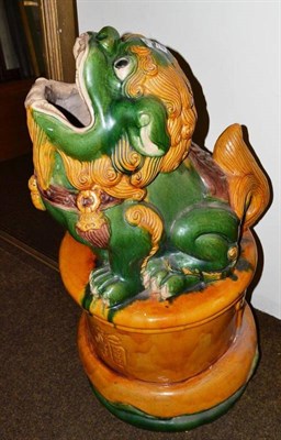 Lot 470 - A Chinese pottery floor standing dog of Fo