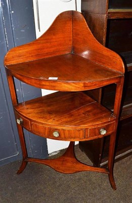 Lot 482 - A George III mahogany corner washstand