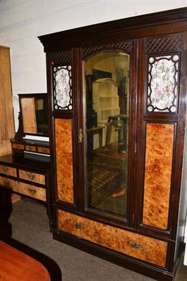 Lot 485 - An Edwardian wardrobe and dressing table with walnut veneer panels