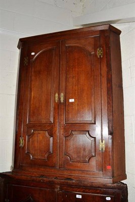 Lot 487 - A Georgian oak corner cupboard