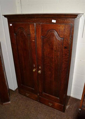 Lot 490 - Georgian oak two door cupboard with two drawers below