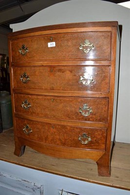 Lot 505 - A reproduction mahogany and burr walnut chest of drawers