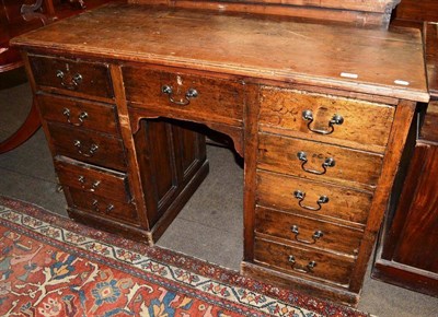 Lot 515 - A pine pedestal desk