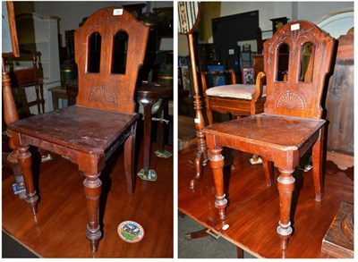 Lot 521 - Pair of Victorian mahogany hall chairs