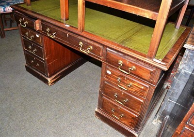 Lot 530 - A mahogany pedestal desk with green leather insert