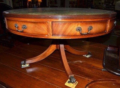 Lot 532 - A reproduction drum coffee table