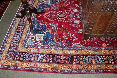 Lot 543 - Tabriz rug, the claret floral field with a pole medallion framed by spandrels and indigo...