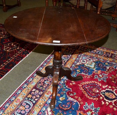 Lot 544 - A Georgian mahogany occasional table bird cage supports