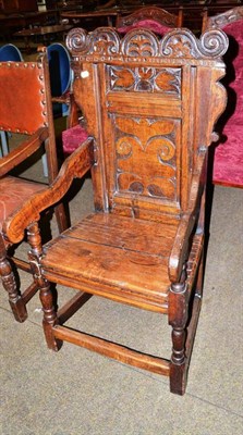 Lot 558 - A carved oak Wainscott armchair