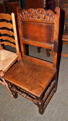 Lot 559 - Oak panel back chair