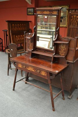 Lot 903 - An Art Nouveau Scottish Inlaid Mahogany Dressing Table, the rectangular mirror inlaid with...