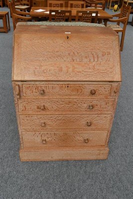 Lot 904 - An Art Deco Heal's Limed Oak Bureau, the fall front opening to reveal a fitted interior, above four