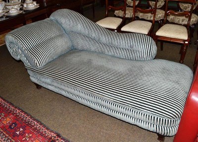 Lot 576 - A Victorian blue velvet striped chaise longue