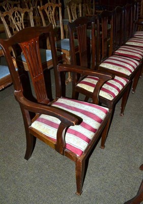 Lot 579 - A set of six mahogany dining chairs including two carvers