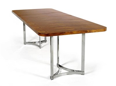 Lot 905 - A 1970's Merrow Associates Rosewood Extending Dining Table, the shaped rectangular top on two three