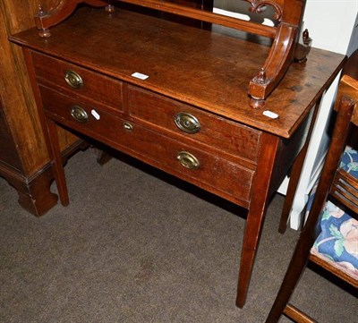 Lot 602 - A 19th century oak side table with three drawers