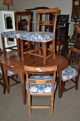 Lot 604 - Six mahogany dining chairs with bar backs and a George III mahogany dining table (repairs)