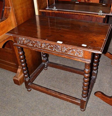 Lot 620 - An early 18th century oak side table