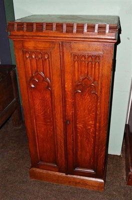 Lot 626 - A Victorian Gothic oak collector's cabinet