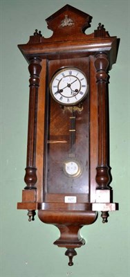 Lot 627 - A walnut cased wall clock