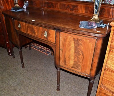 Lot 630 - A reproduction mahogany inlaid sideboard with reeded legs