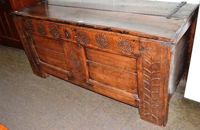 Lot 638 - Large 18th century coffer with metal hinges and floral carved detailing