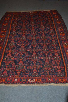 Lot 702 - Bidjar kilim Persian Kurdistan, The indigo field with rows of tribal motifs, 213 by 161 cm