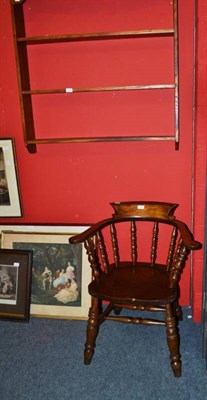 Lot 714 - Captain's chair and a hanging wall rack