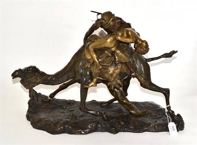 Lot 929 - After Giuseppe Ferrari: A Large Bronze Figure Group of a Bedouin Riding a Camel, carrying a...