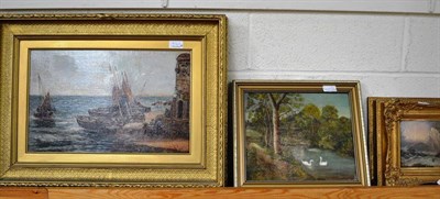 Lot 416A - A gilt framed oil on canvas, fishing boats on a harbour, M.A.C 1912, a framed oil, swans on a river