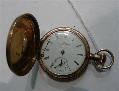 Lot 7 - A yellow metal cased fob watch