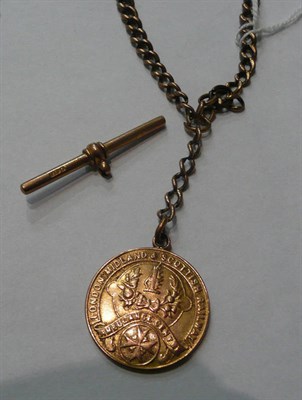 Lot 20 - A 9ct rose gold Albert with long service medal and T-bar