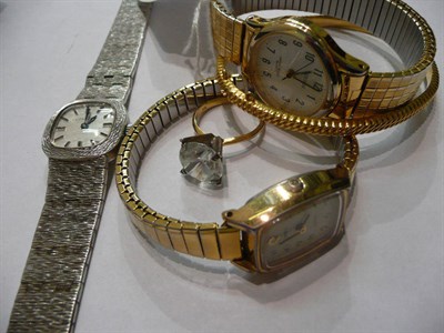 Lot 24 - A lady's silver Longines wristwatch, two lady's wristwatches and a 9ct gold bangle and a ring