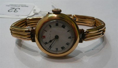 Lot 32 - A lady's wristwatch with expanding bracelet