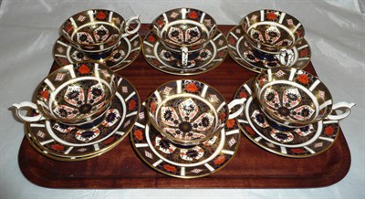 Lot 65 - Six Royal Crown Derby Imari pattern tea cups and seven saucers