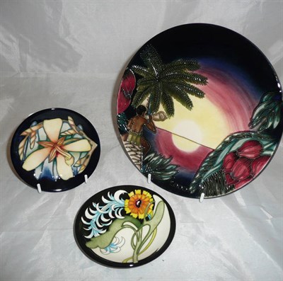Lot 84 - Moorcroft Birth of Light plate and two Moorcroft collectors club dishes (3)