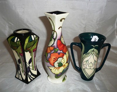 Lot 116 - Two modern Moorcroft collectors club vases and another Moorcroft vase (3)