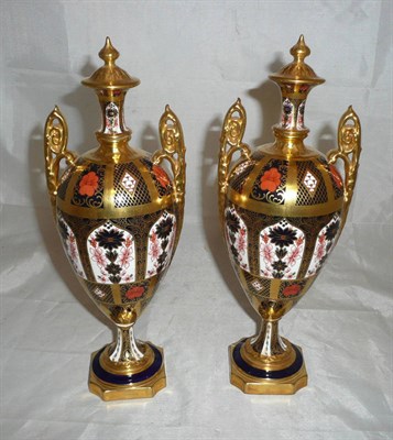 Lot 117 - Pair of Royal Crown Derby twin handled vases