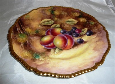 Lot 122 - A Royal Worcester rope edge plate painted with fruit, signed J Smith