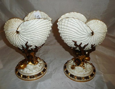 Lot 127 - A pair of Royal Worcester Nautillis vases