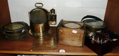 Lot 141 - Three brass compasses (cased) and a mahogany electric machine