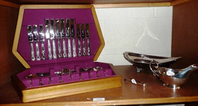 Lot 152 - Plated canteen of cutlery, plated oval dish, sauce boat and sugar nips