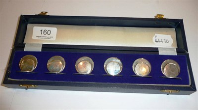 Lot 160 - A set of six silver menu holders, cased