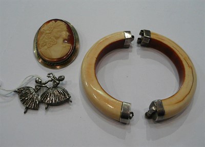 Lot 165 - A silver double ballerina brooch, a silver cameo brooch and an ivory bangle (a.f.)