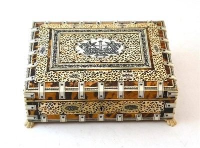 Lot 954 - An Indian Tortoiseshell and Ivory Box, 19th century, of rectangular form, the domed cover set...