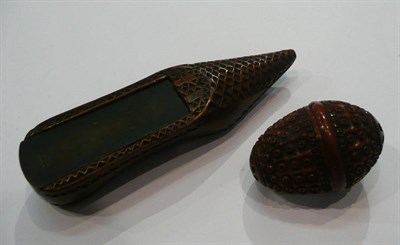 Lot 194 - Carved wooden shoe and a coquille nut thimble case